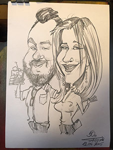 Karikaturista Janko kreslí vtipné portréty zamestnancov na firemnom večierku v Žiline .